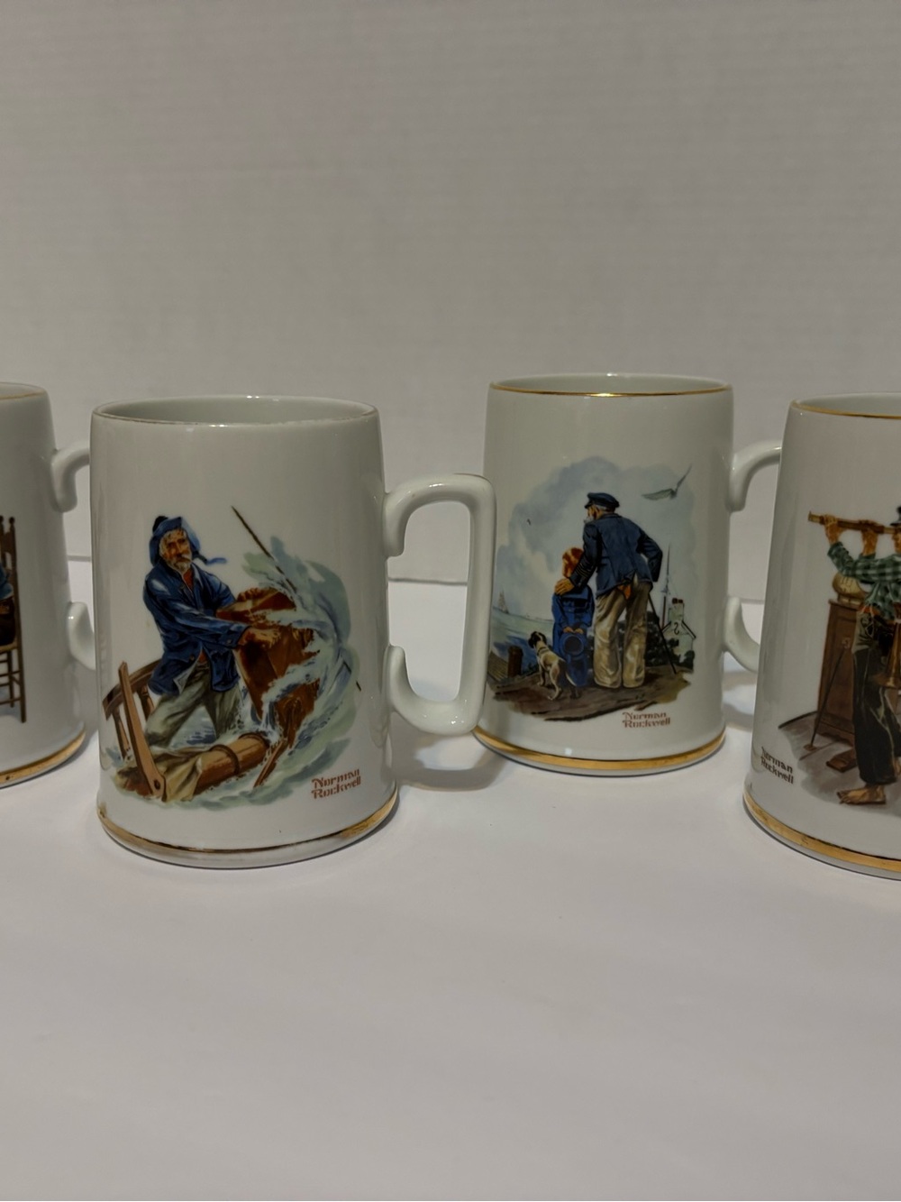 Norman Rockwell White Ceramic Nautical Scene Mugs with Gold Trim